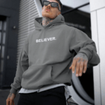 BUZO HOODIE BELIEVER GRIS